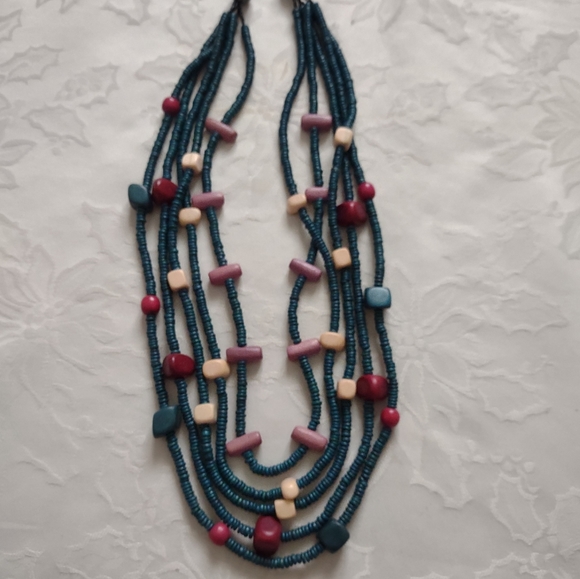 Vintage Jewelry - Five layer rondelles green red pink various shapes wooden necklace